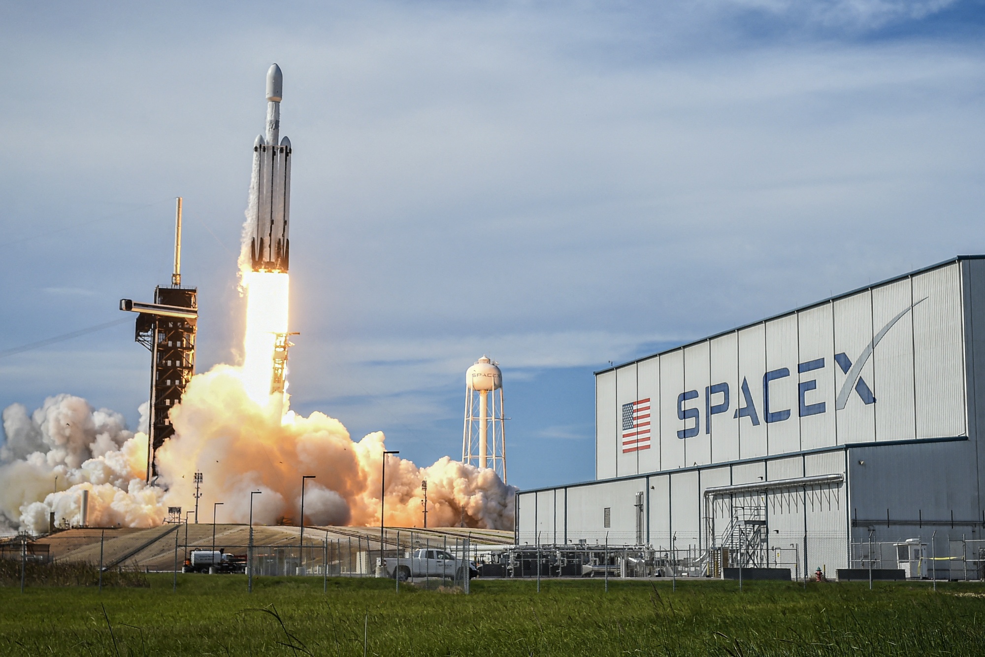 A SpaceX Falcon Heavy rocket carrying the National Oceanic and Atmospheric Administration's weather satellite lifts off at NASA's Kennedy Space Center in Florida in 2024. Photographer: MIGUEL J. RODRIGUEZ CARRILLO/AFP