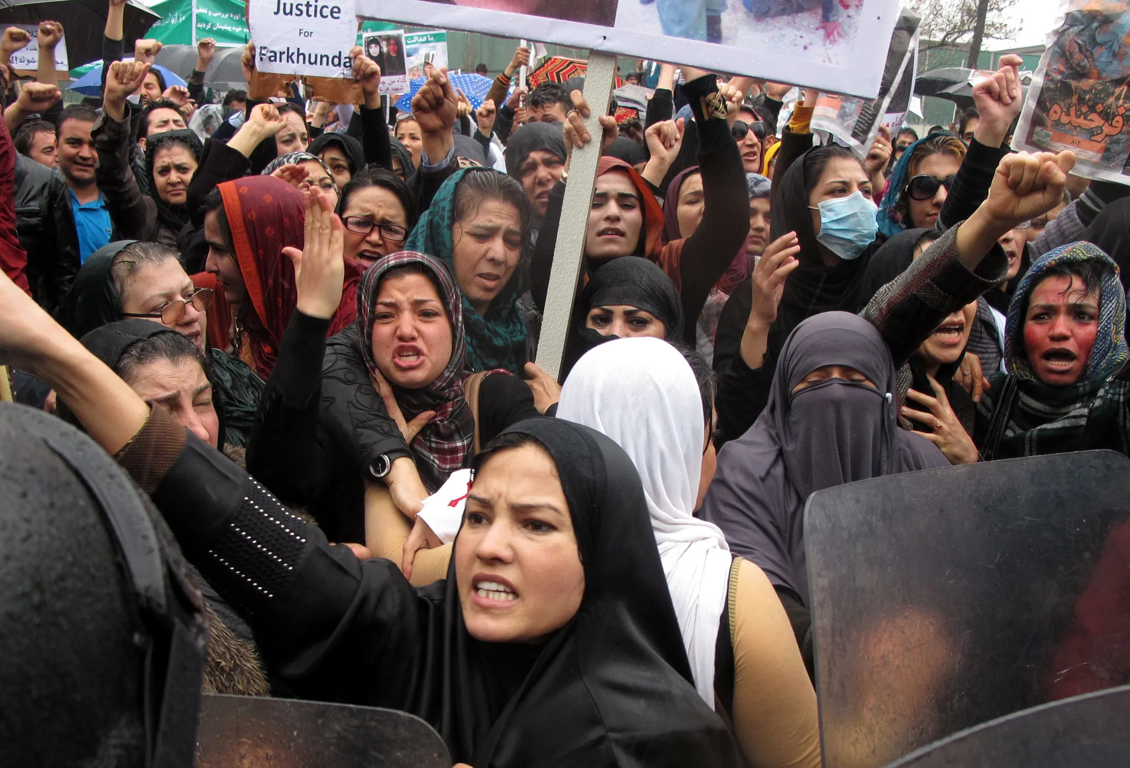 Afghan protesters shout slogans during a rally in front of the Supreme Court in Kabul, Afghanistan, March, 24. Thousands protest in Kabul to call for justice after Farkhunda was brutally killed by a mob over allegations she had burned a Quran. The woman, 27 year-old Farkhunda was thrown off a roof, run over with a car, set on fire and thrown into a river near a well-known mosque in Kabul.
