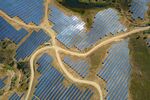 Roads cross between clusters of photovoltaic panels at the Solara 4 solar park&nbsp;in Vaqueiros, Faro district, Portugal.&nbsp;