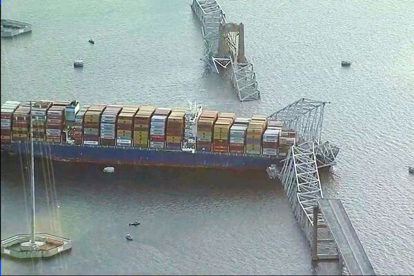 The collapsed Francis Scott Key Bridge after being struck by the Dali container ship.