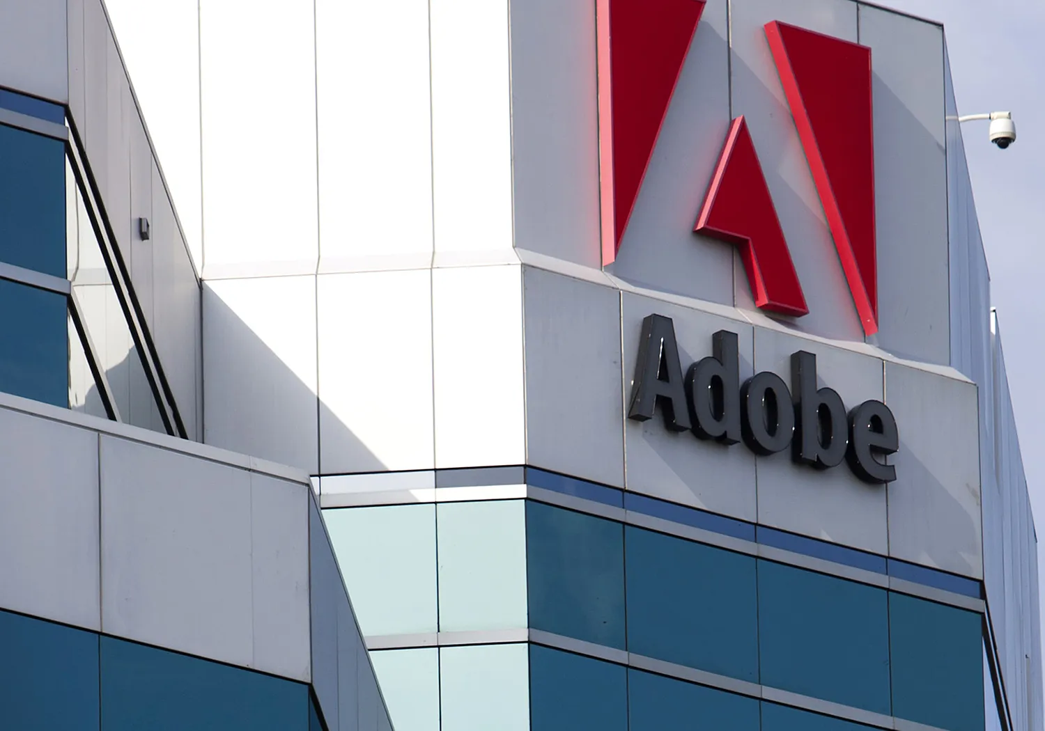 Signage is displayed outside an Adobe System Inc. office in Ottawa, Ontario, Canada.