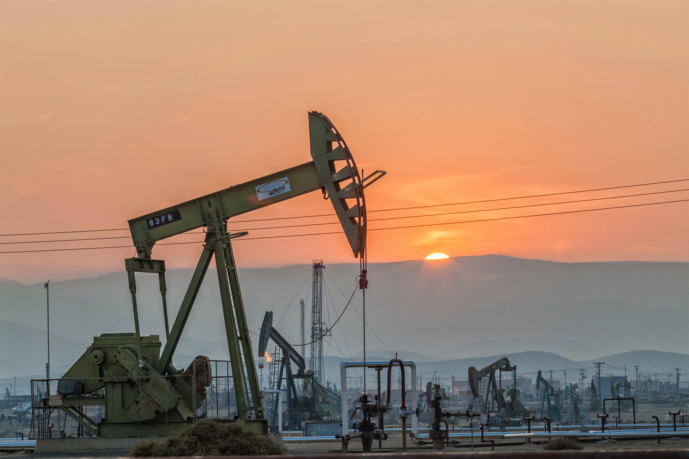 Pump jacks at the Belridge Oil Field and hydraulic fracking site in Kern County, San Joaquin Valley, California.&nbsp;
