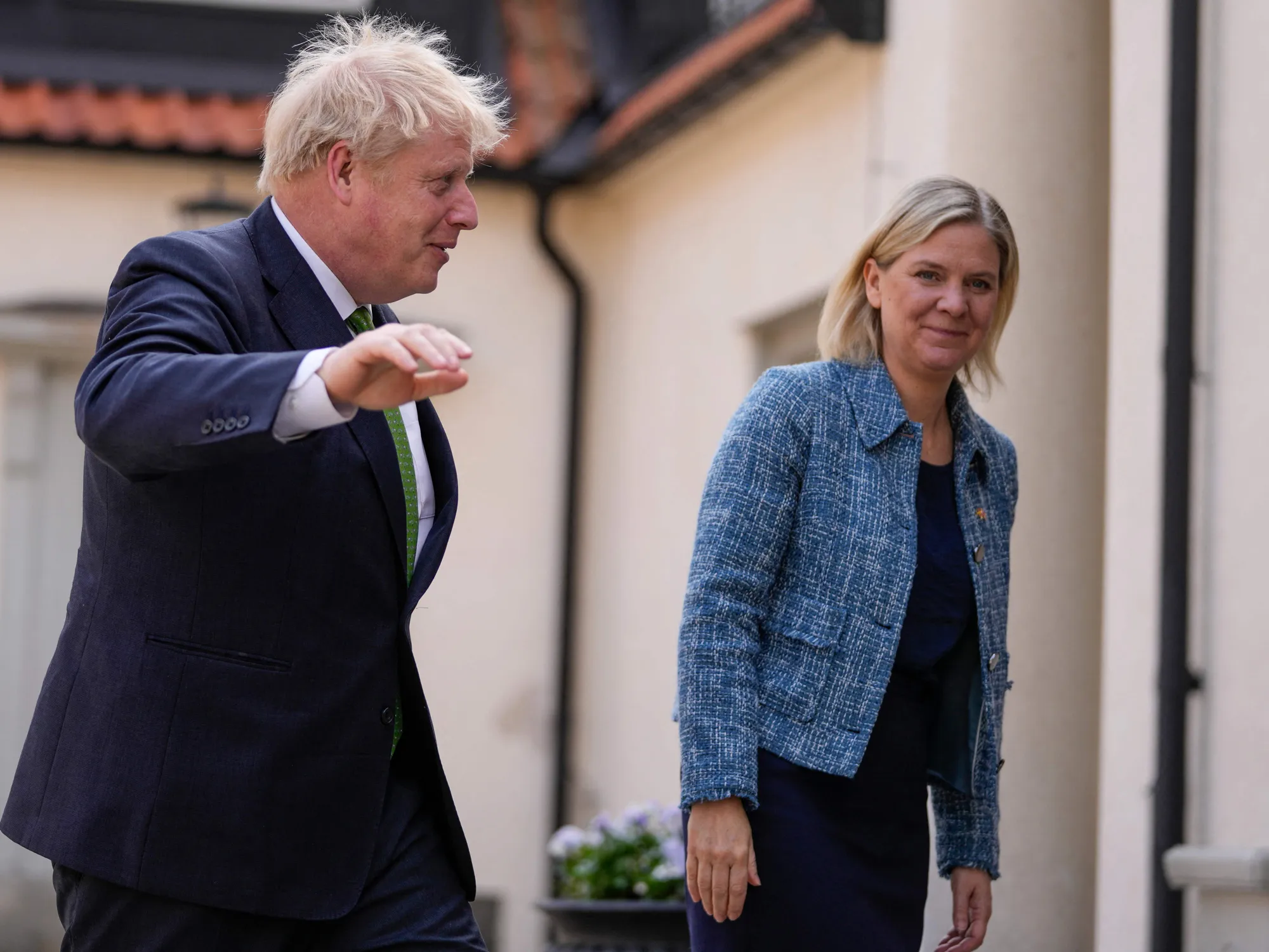 Boris Johnson is greeted by Magdalena Andersson in Harpsund, Sweden, on May 11.