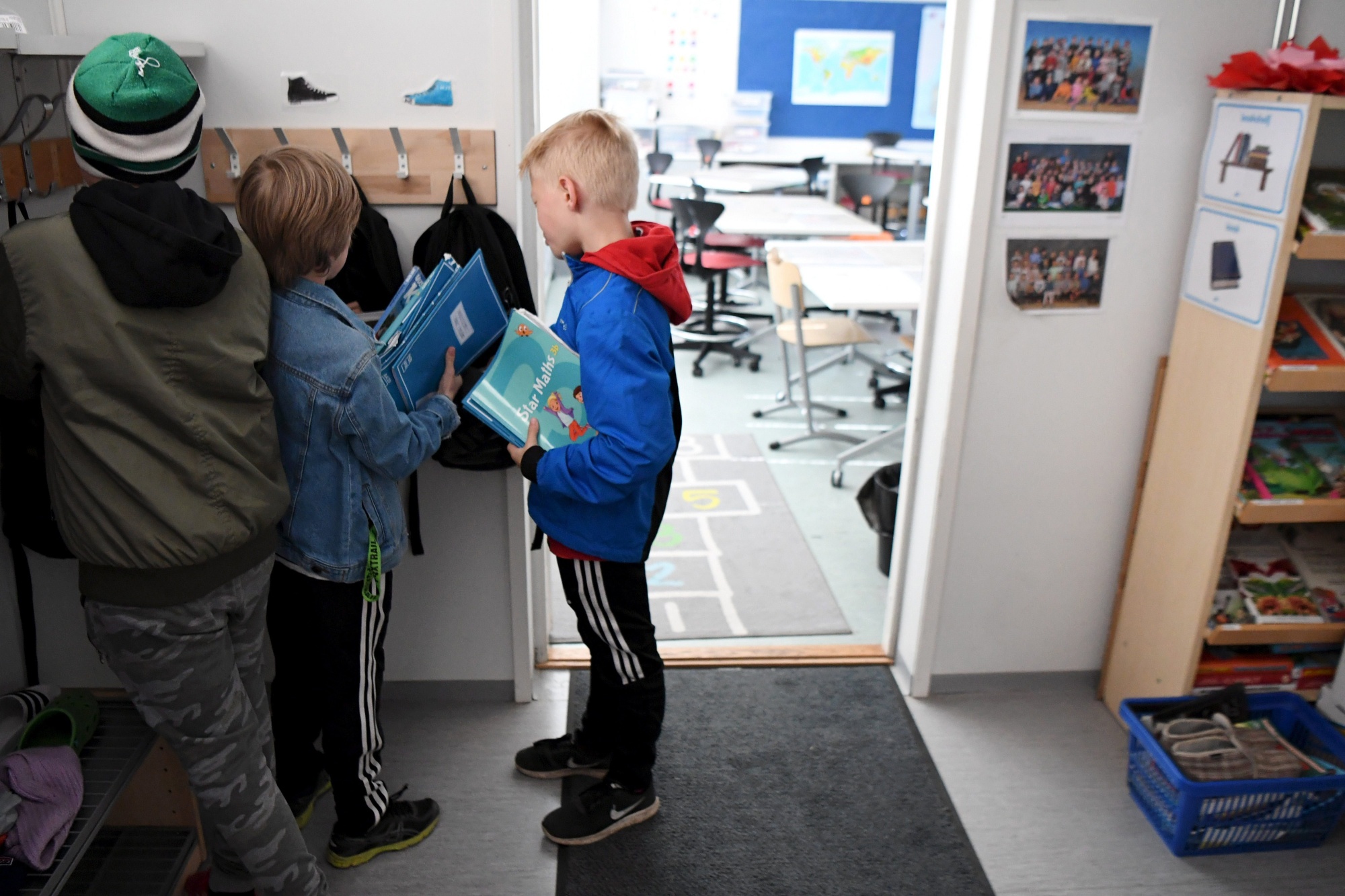 Pupils get ready for a class at an elementary school in Helsinki in May.