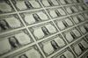 A 50 subject one dollar note sheets sits on an inspecting table after being printed by an intaglio printing press at the U.S. Bureau of Engraving and Printing in Washington, D.C., U.S., on Tuesday, April 14, 2015. Republican efforts to pass a fiscal year 2016 budget cleared another hurdle as the House named its members to a conference committee and Senate Majority Leader Mitch McConnell pledged to do the same by the end of the week.