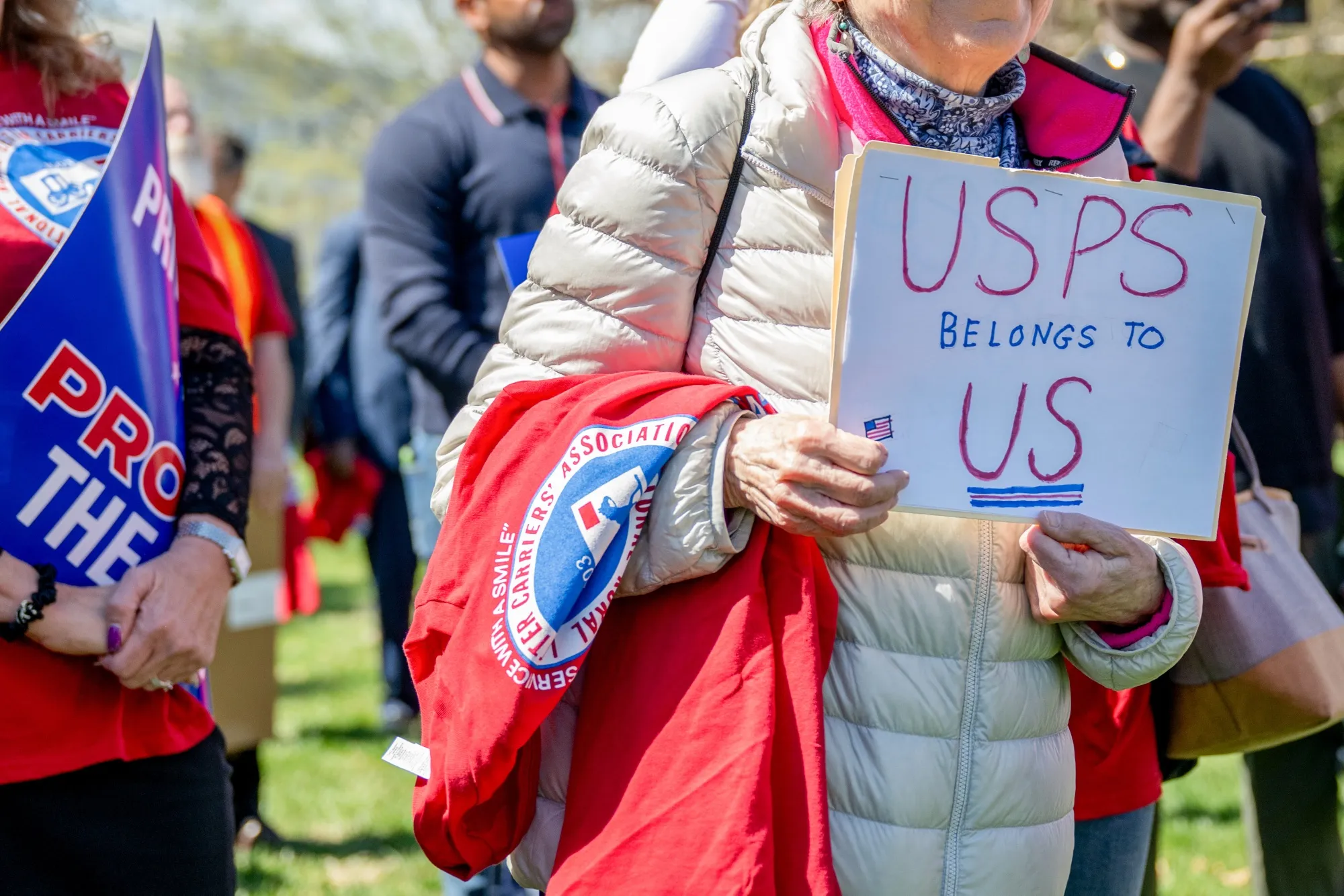 Members of the National Rural Letter Carriers Association rally on Tuesday&nbsp;on Capital Hill in Washington in support of the Postal Service.&nbsp;