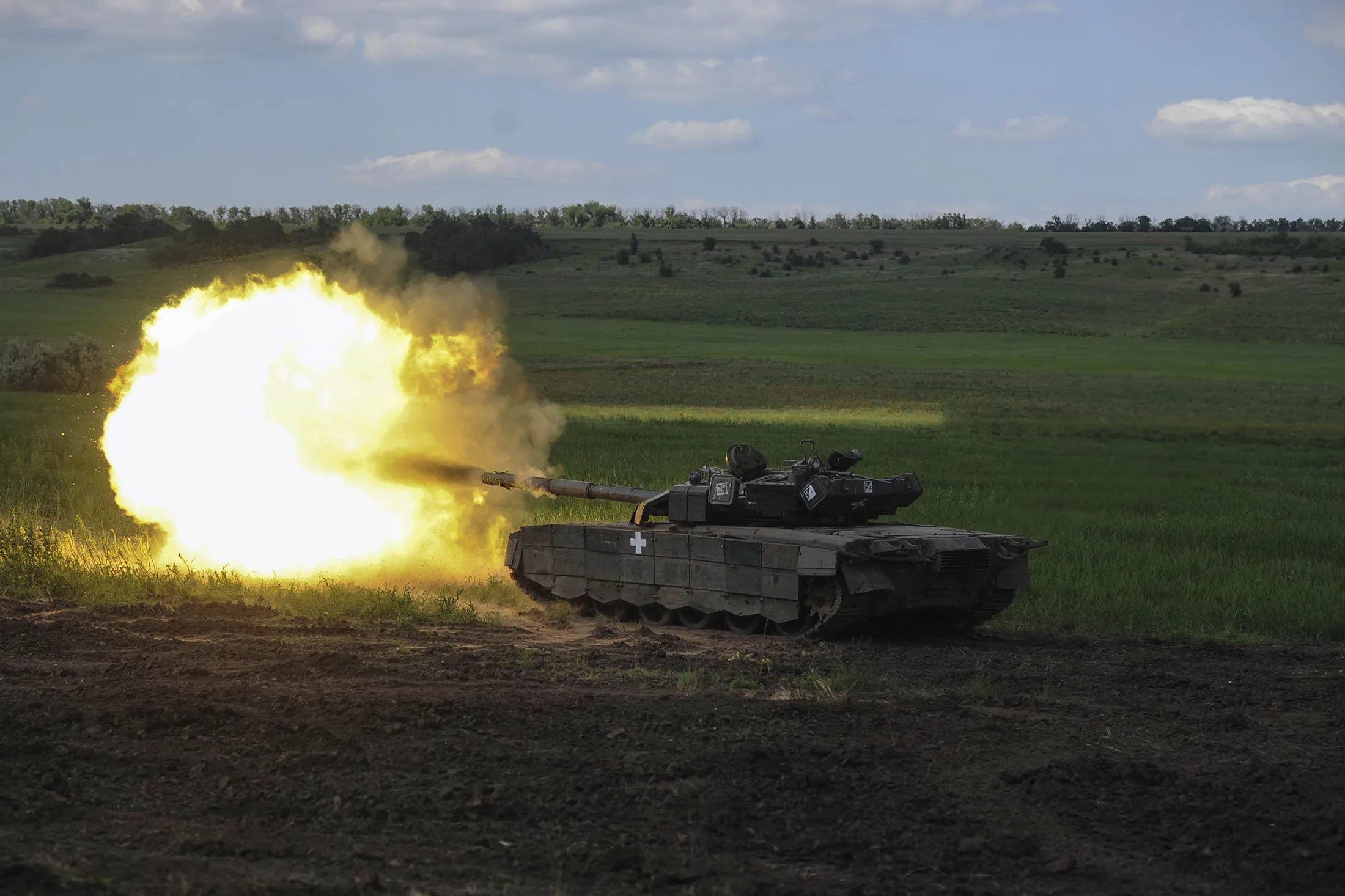 A Ukrainian tank fires during fighting in Chasiv Yar, Ukraine, on June 7.
