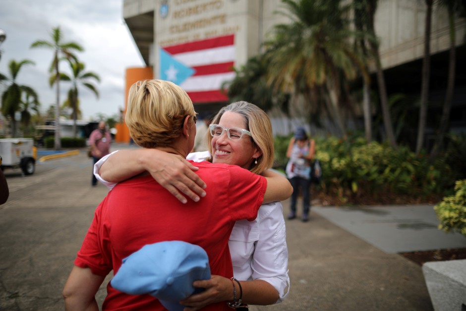 Mayor of San Juan Carmen Yulin Cruz embraces Esperanza Ruiz, a city administrator, after Hurricane Maria.