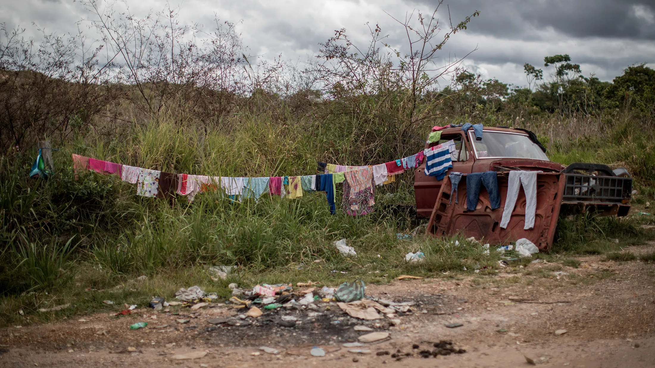 Clothing belonging to Venezuelan migrants hang at a temporary shelter along BR 174 highway in Pacaraima, Roraima state.
