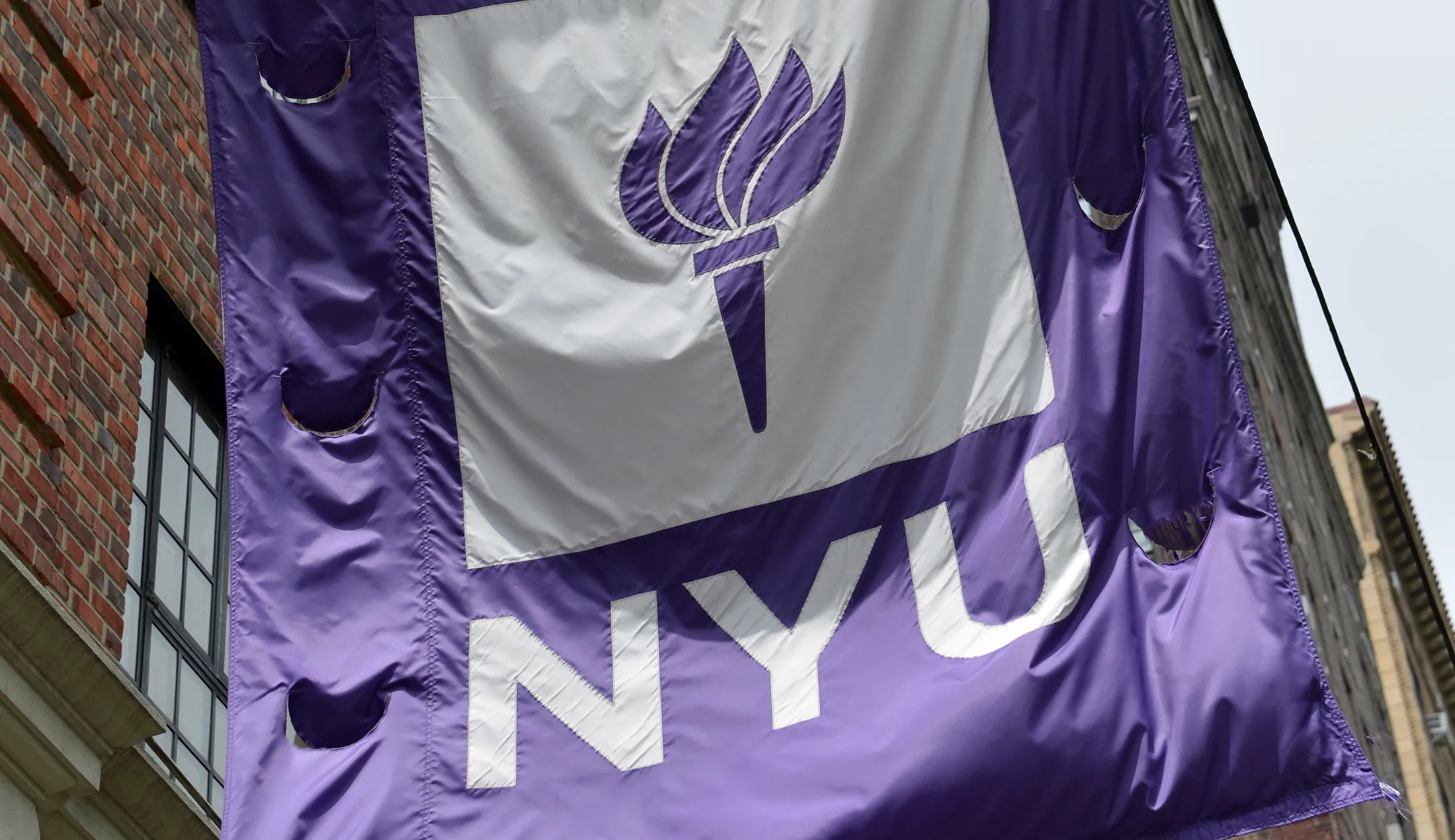A flag flies from a building at New York University May 4, 2012 in New York.
