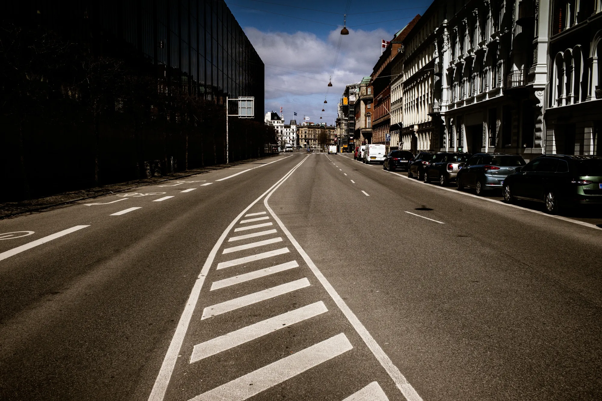 A road stands devoid of traffic in Copenhagen, Denmark, on Wednesday, April 15, 2020. Danish Prime Minister Mette Frederiksen says her government's efforts to fight Covid-19 have been so successful that the country may now be facing a broader rollback of its lockdown than originally planned.