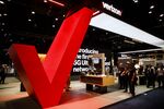 Attendees visit the Verizon Communications Inc. booth during the Mobile World Congress Americas in Los Angeles.