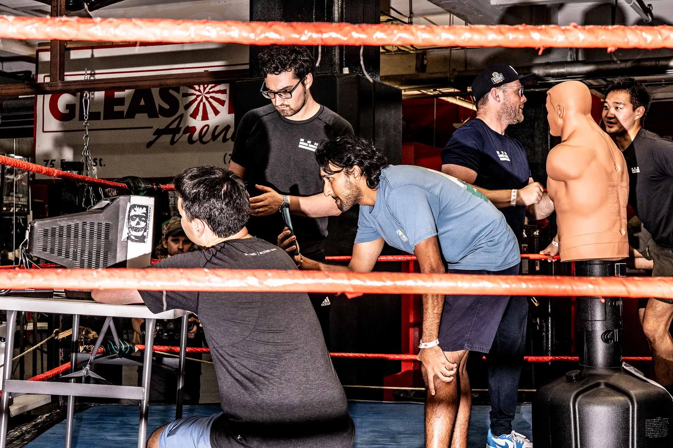 A team from Citadel Securities works on a boxing puzzle at Gleason’s Gym in Brooklyn.