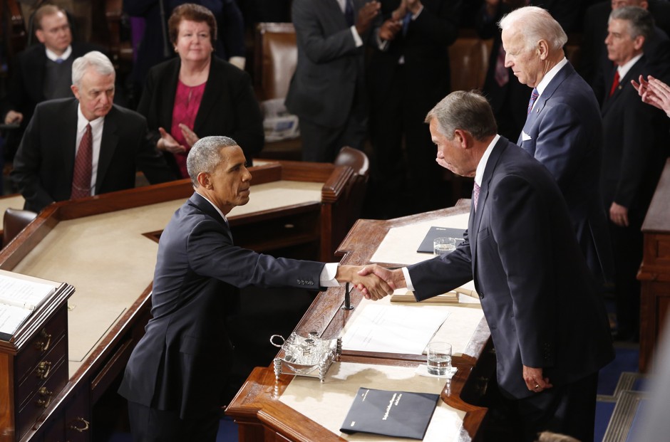U.S. President Barack Obama shakes hands with Speaker of the House John Boehner at the end of President Obama's 2015 State of the Union address. 