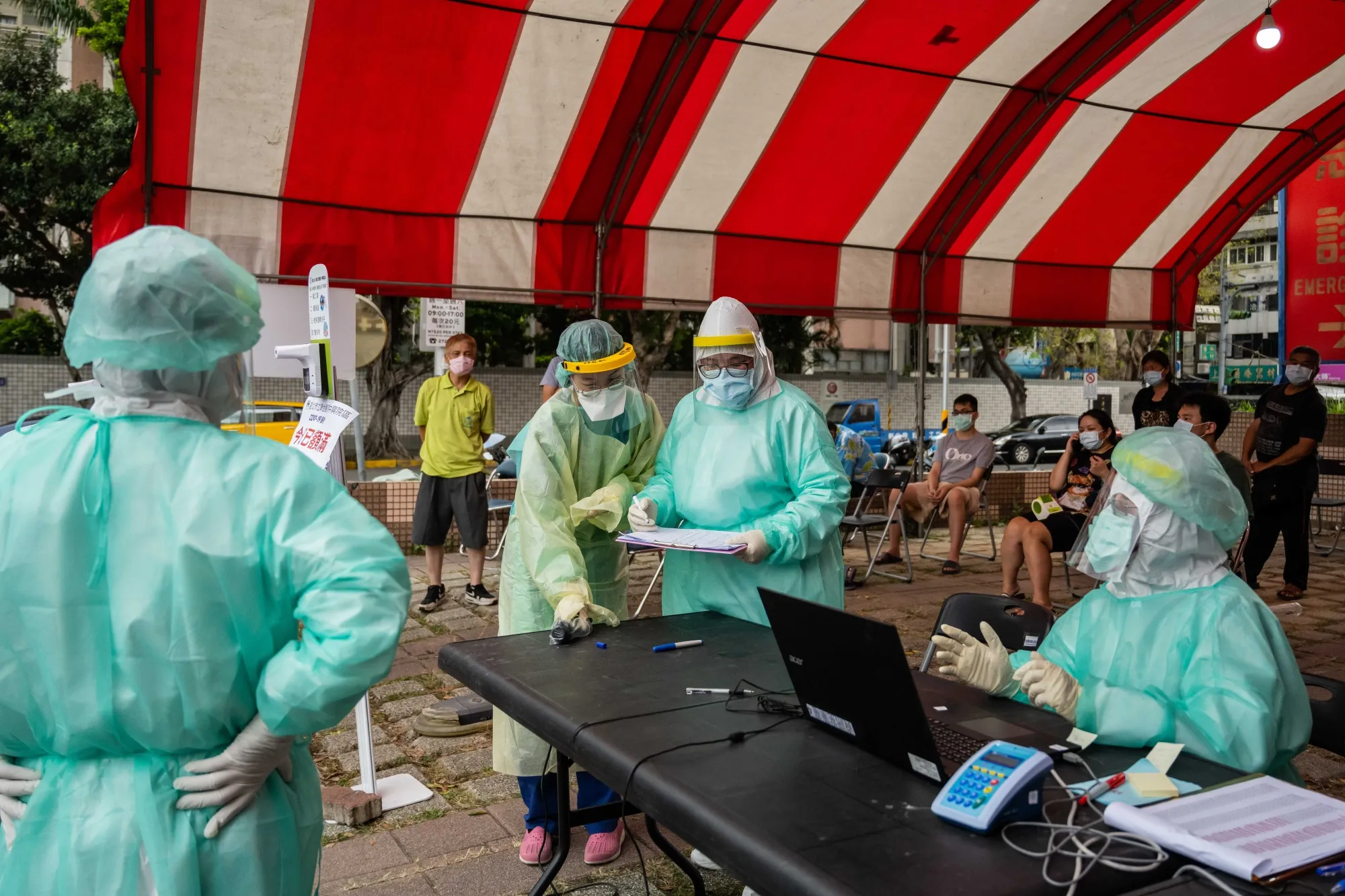 Healthcare workers&nbsp;at a temporary rapid Covid-19 testing site in Taipei on May 17.