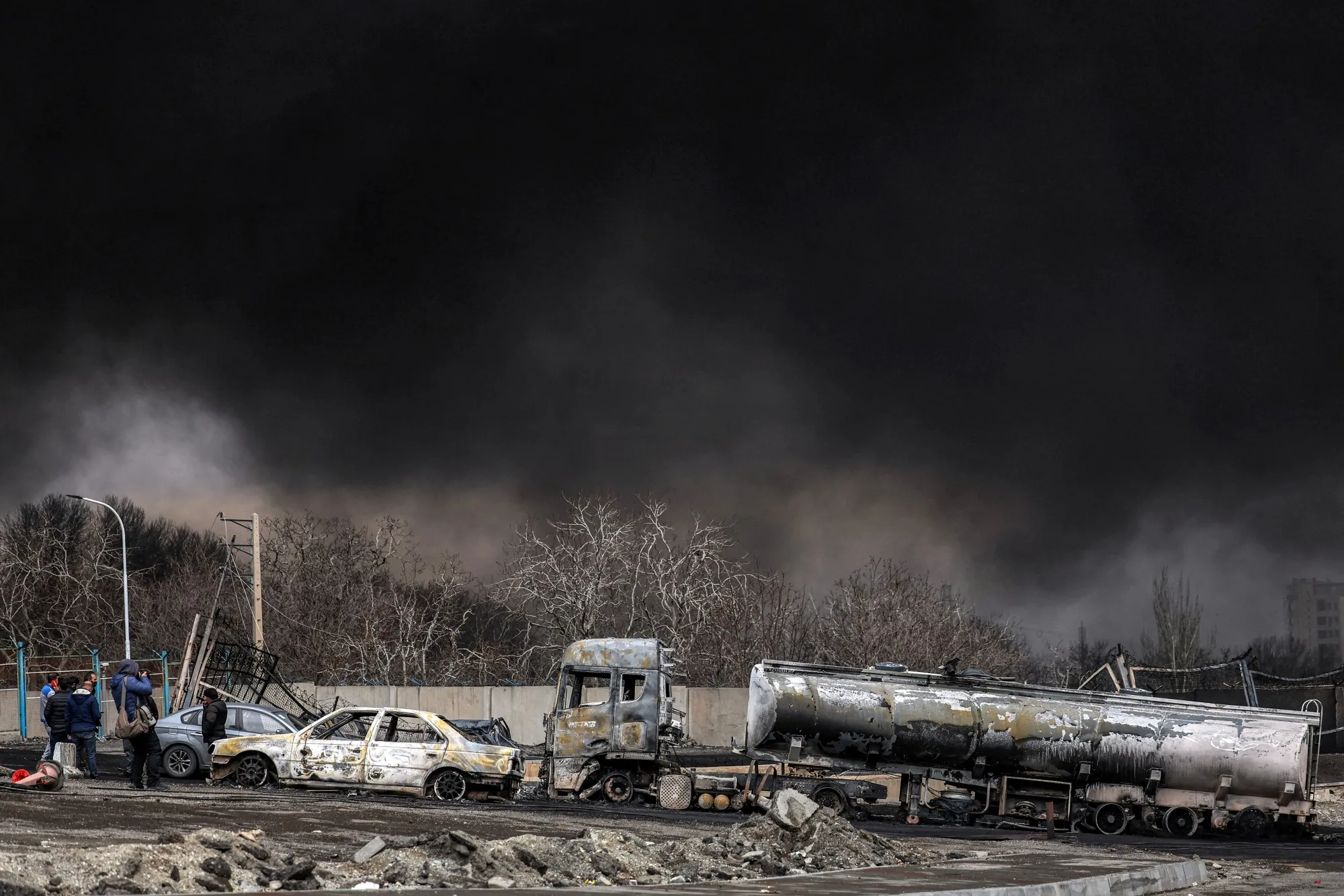 A dark smoke cloud near a strike on the Shahran oil refinery in Tehran.