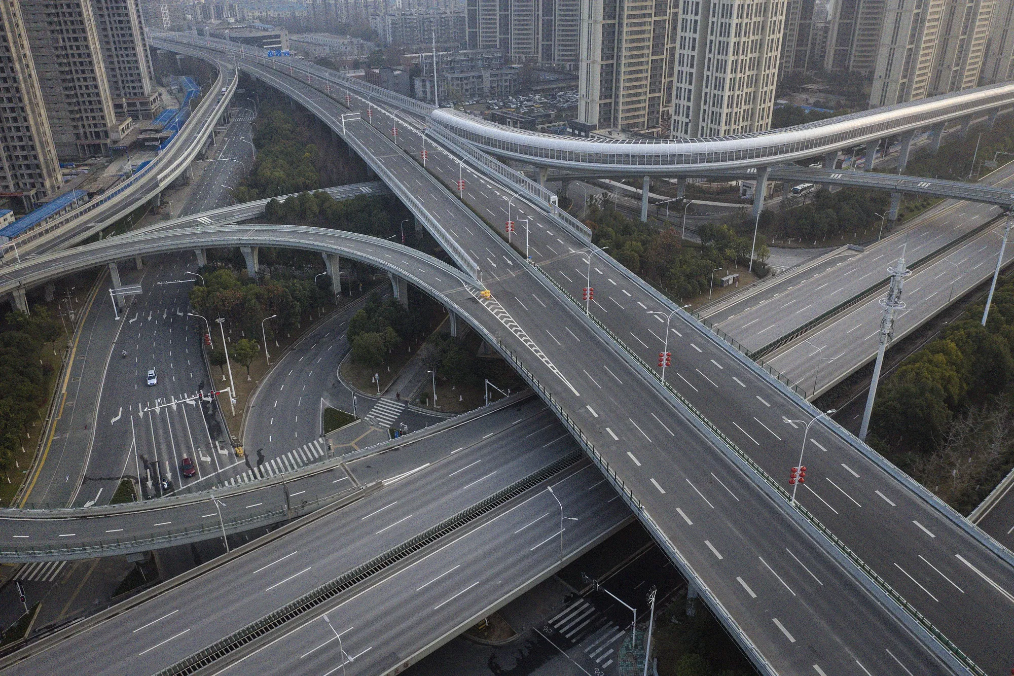 Deserted roads and bridges in Wuhan, Feb. 2020.