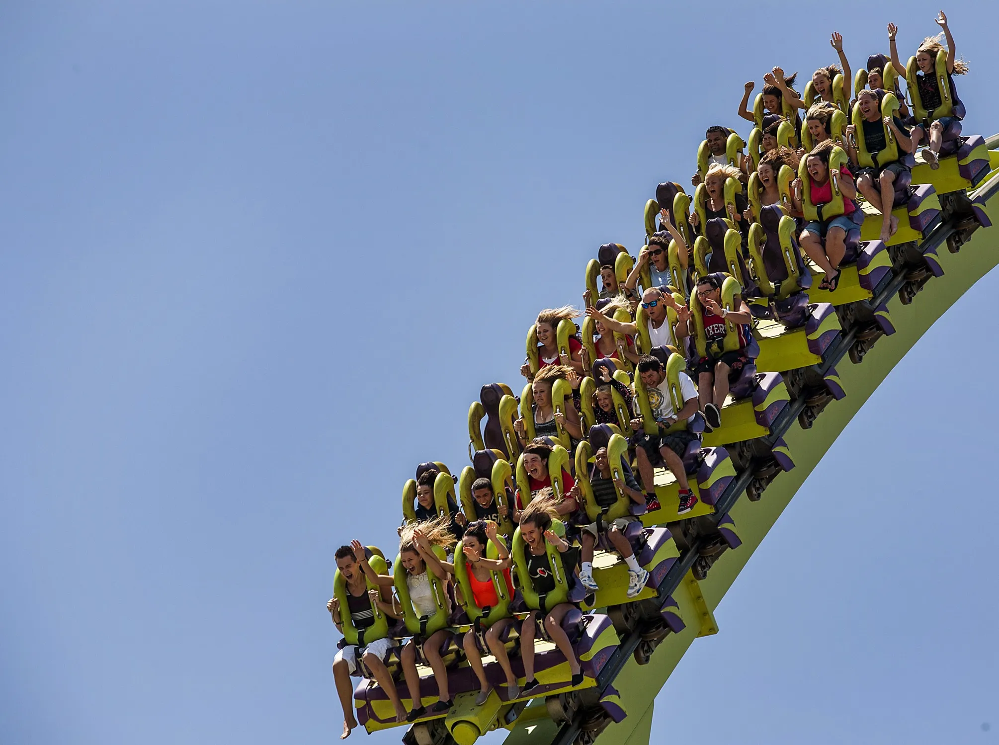 Visitors ride the Medusa roller coaster at Six Flags Discovery Kingdom.