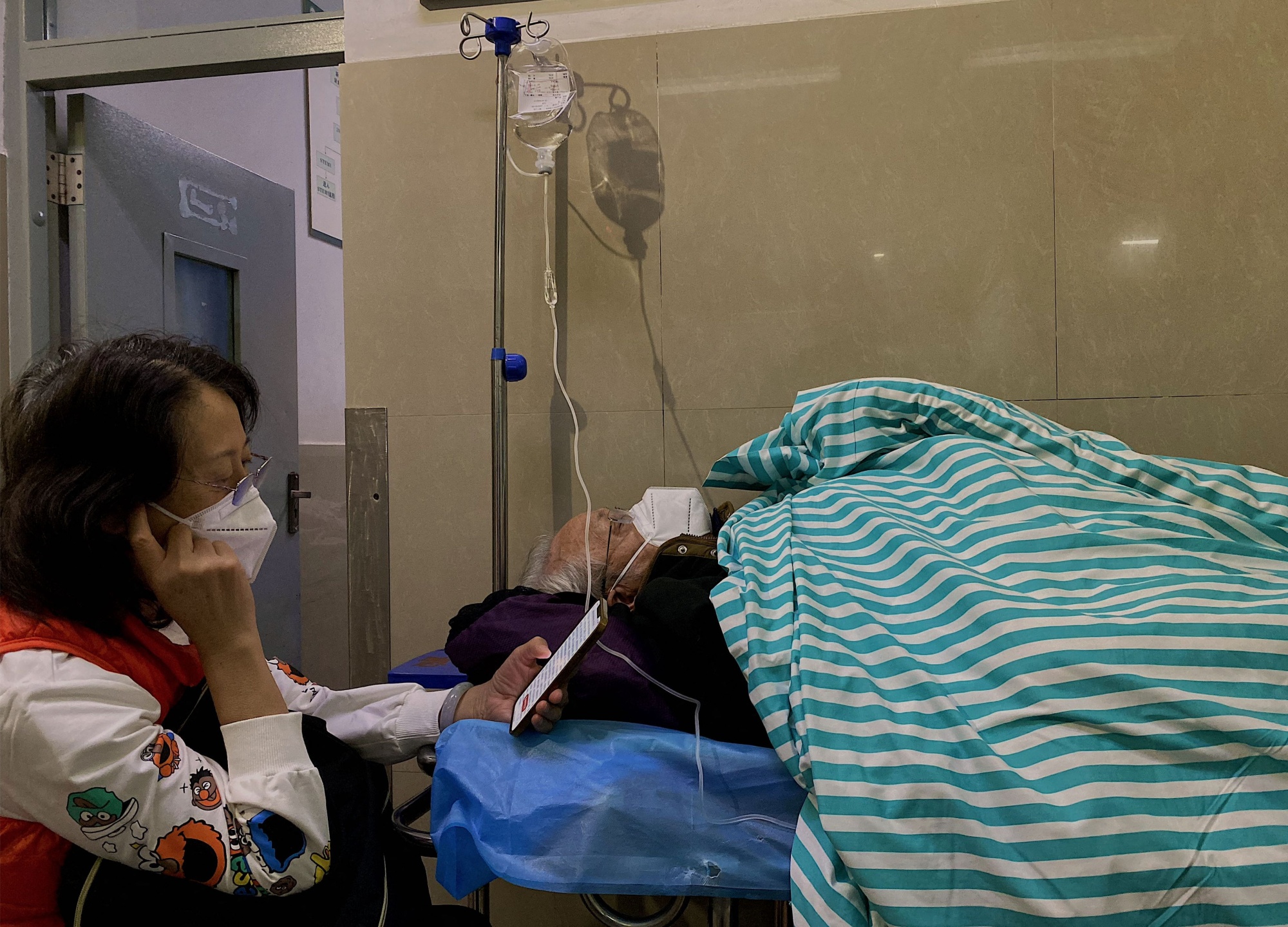 A Covid-19 patient at a hospital in Yunnan province on Jan. 9.