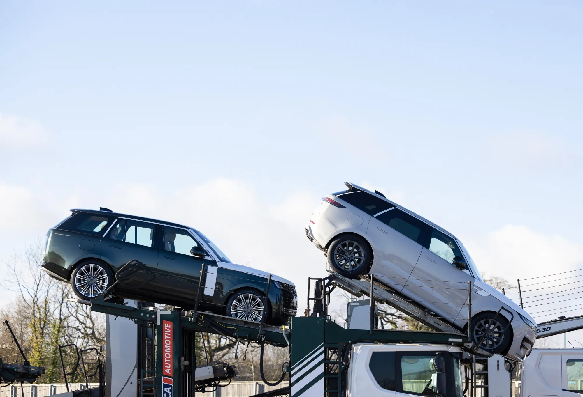 Finished Range Rover vehicles ready for shipment in Solihull, UK.