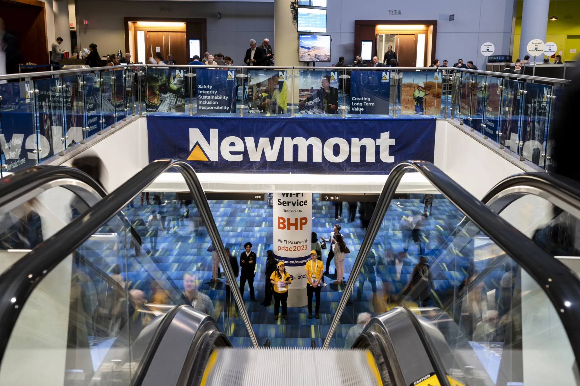 Newmont Corp. signage at the Prospectors &amp; Developers Association of Canada (PDAC) conference in Toronto, Ontario, Canada, on Sunday, March 5, 2023.&nbsp;The world’s top gold producer will seek to sell six mines and two projects in a set of divestitures aimed at generating $2 billion in cash.&nbsp;