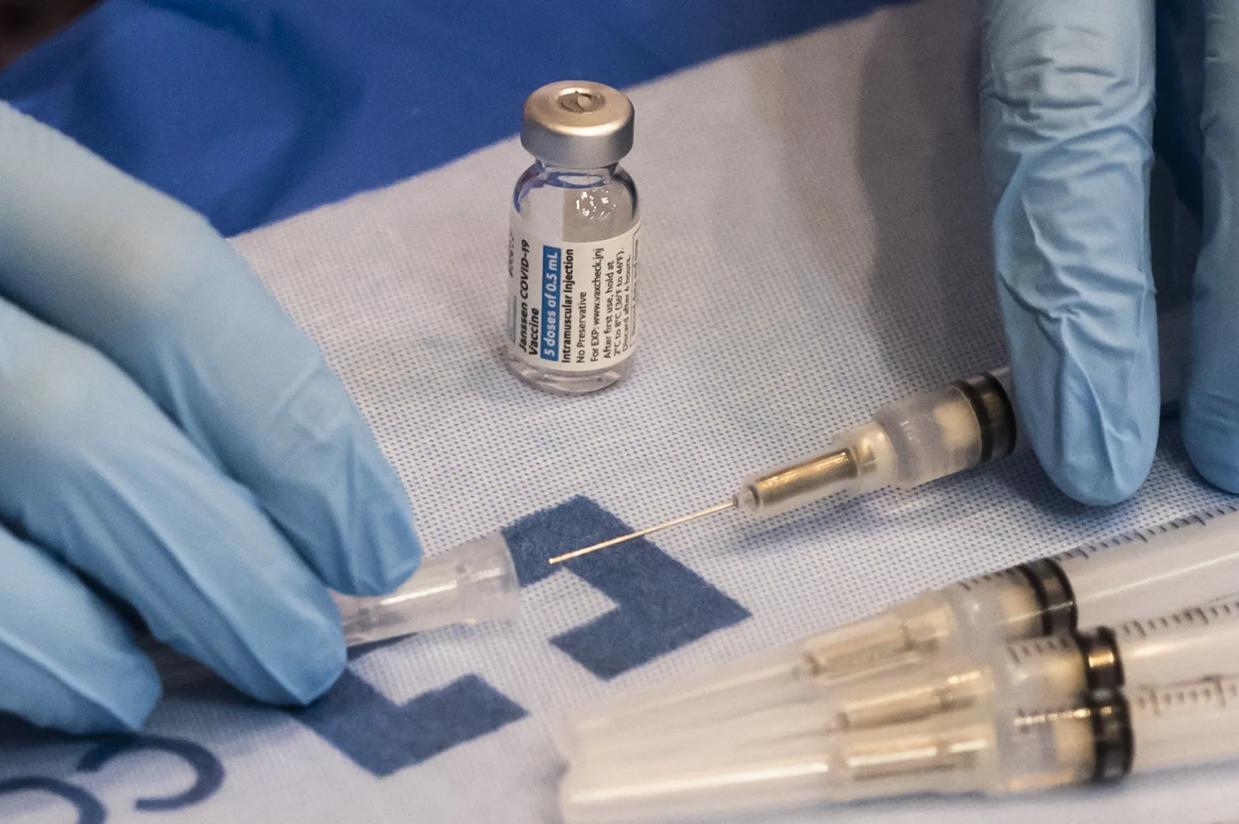 Vaccine-Givers Race Time at an Atlantic City Convention Hall