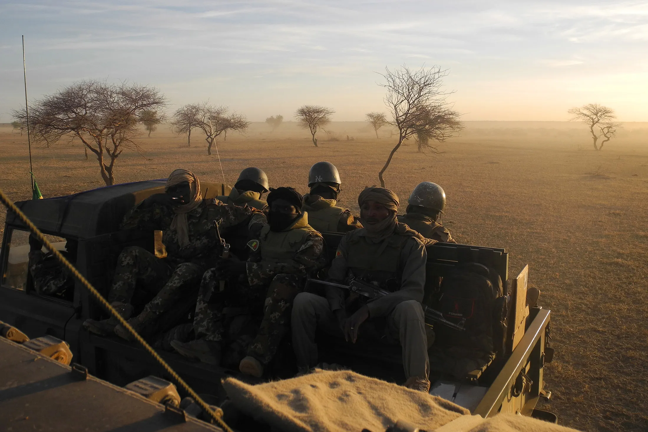 Malian soldiers, part of a joint military force, the G5 Sahel, sit in a vehicle as they patrol on Nov.&nbsp;2, 2017.