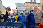 Activists march at COP26 in Glasgow in 2021.&nbsp;
