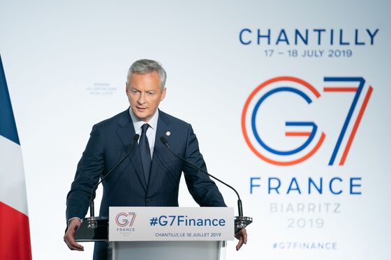 U.S., France Sidestep Tax Feud for Now After G-7 Confrontation