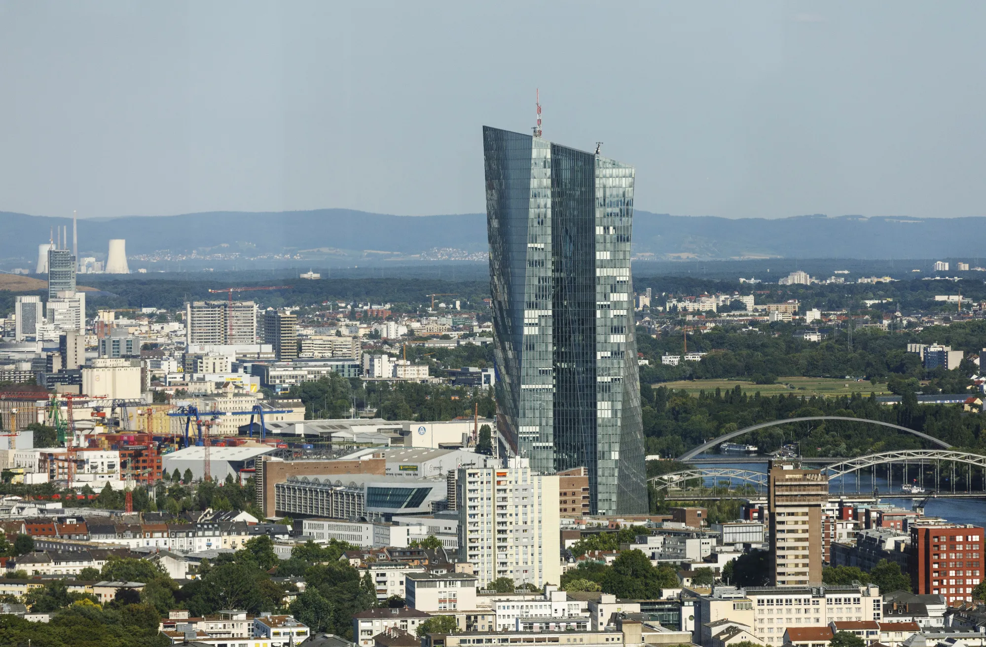 The European Central Bank (ECB) skyscraper headquarters tower above commercial and residential property in Frankfurt, Germany.