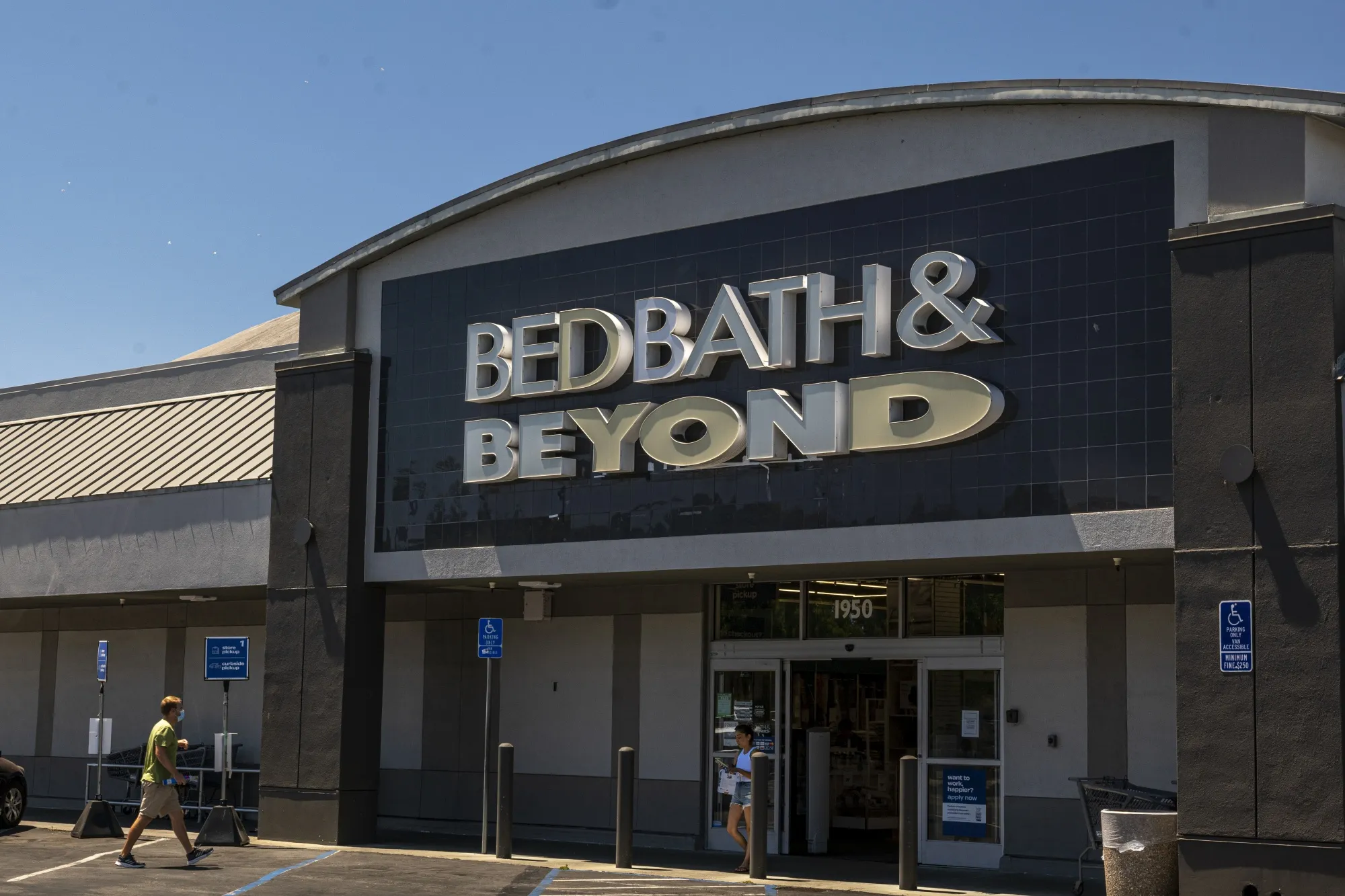 Customers enter a Bed Bath &amp; Beyond store in Redwood City, California.