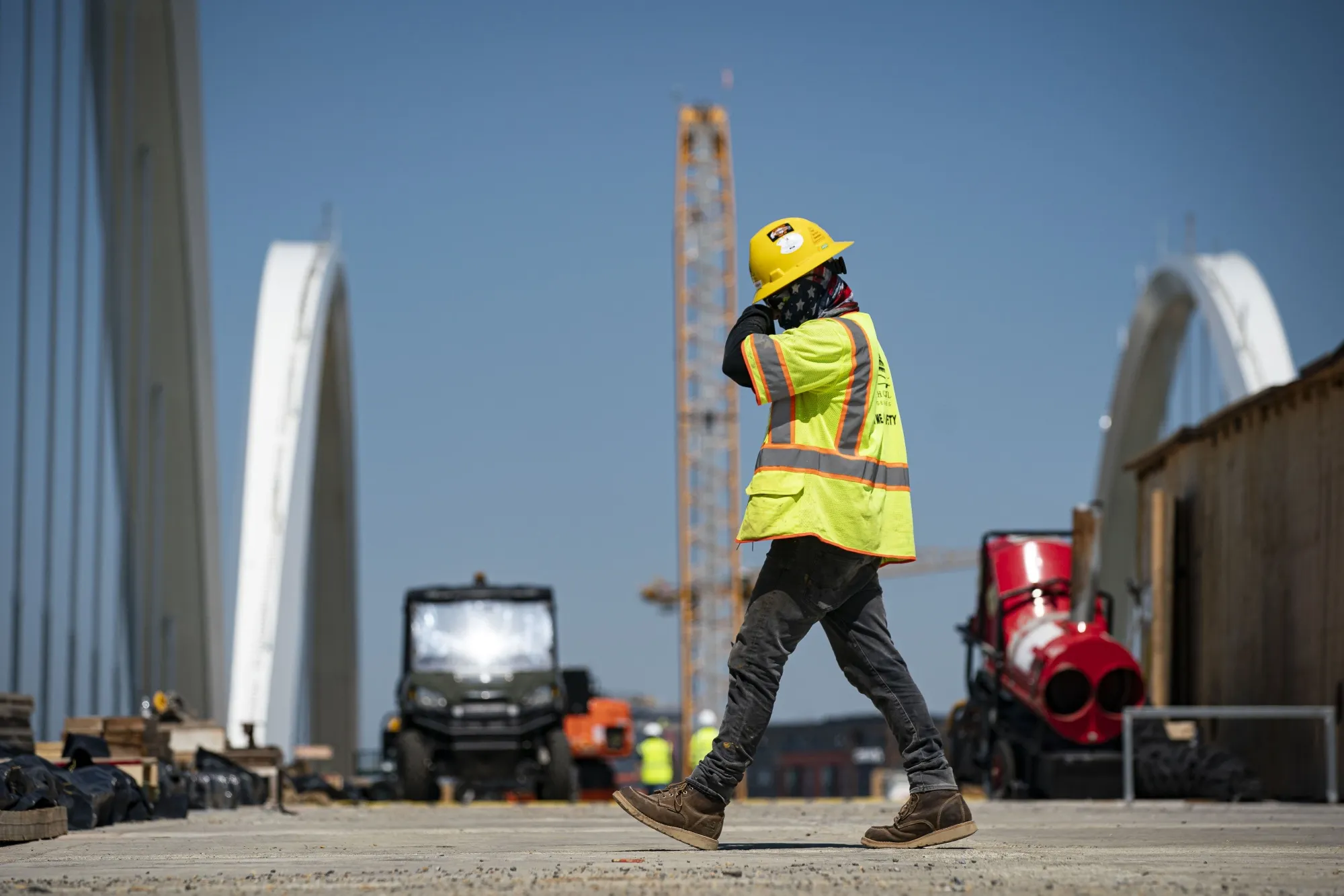 A construction worker on the Frederick Douglass Memorial Bridge in Washington, DC.