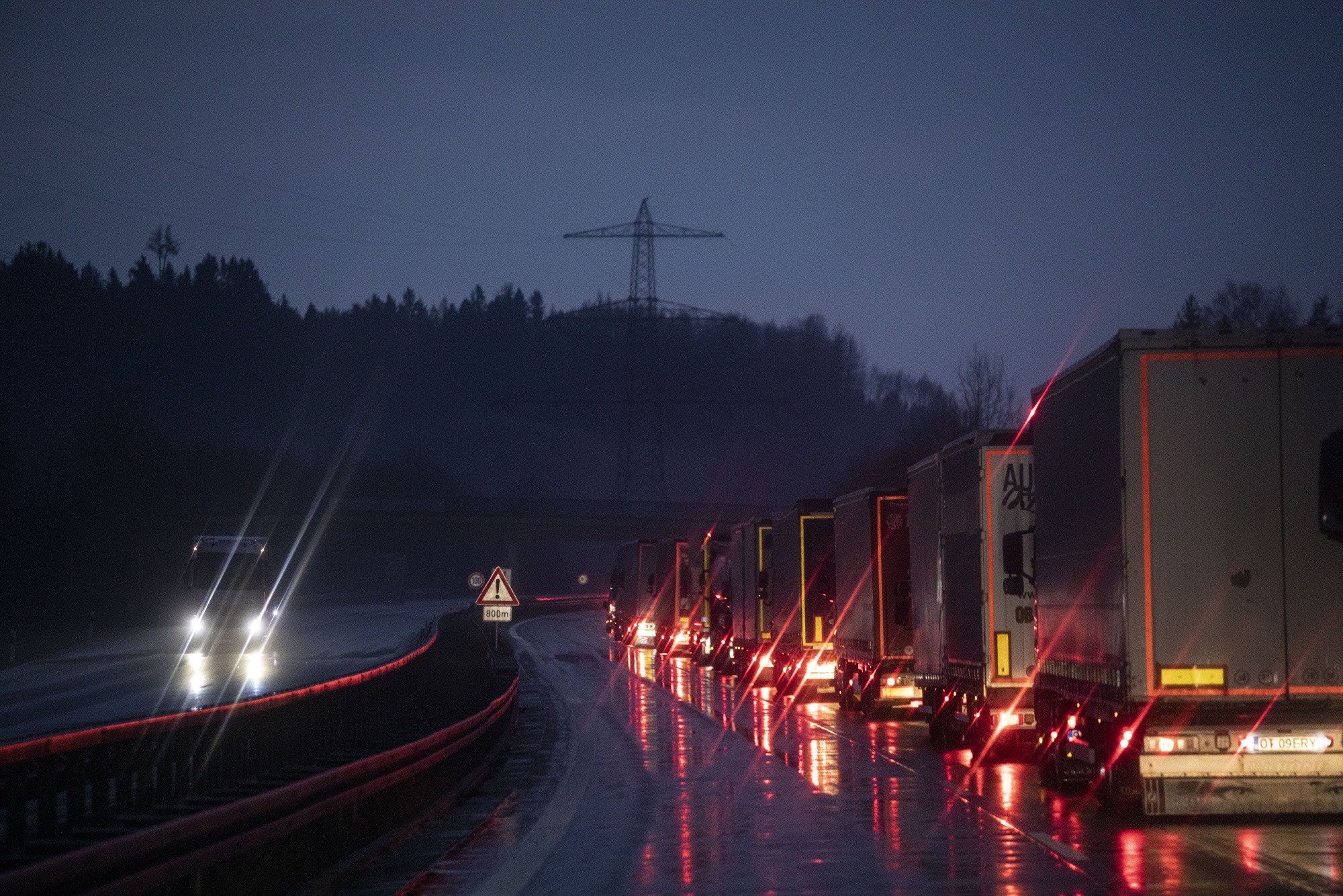 A line of haulage trucks queue with cargo&nbsp;on Germany's border with the Czech Republic on March 17.