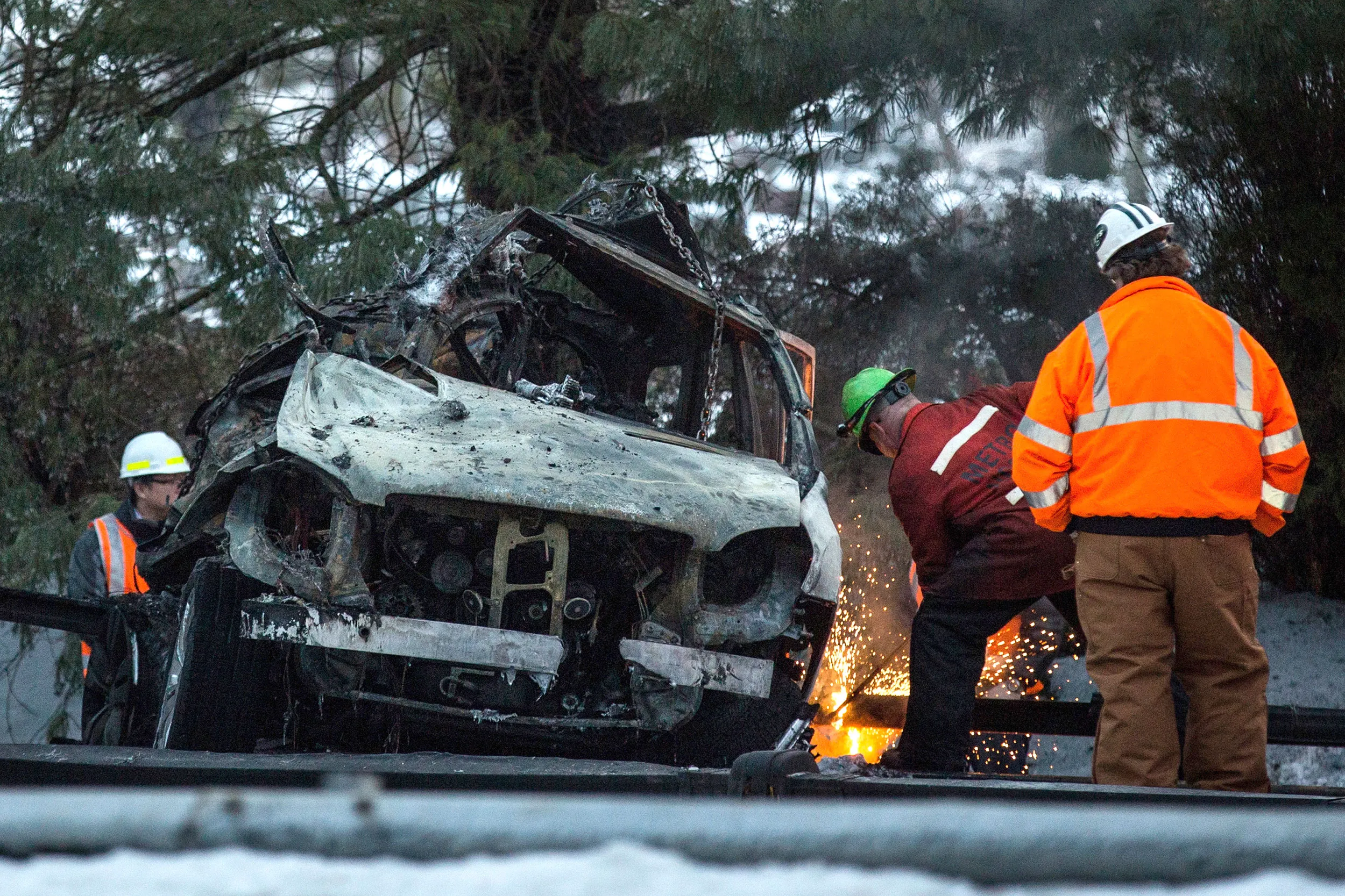 The sport utility vehicle that was hit by a Metro-North train is removed from the site of the accident on Feb. 4, 2015 in Valhalla, New York.
