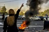 Iranians protests the death of 22-year-old Mahsa Amini in Tehran on Oct. 1.