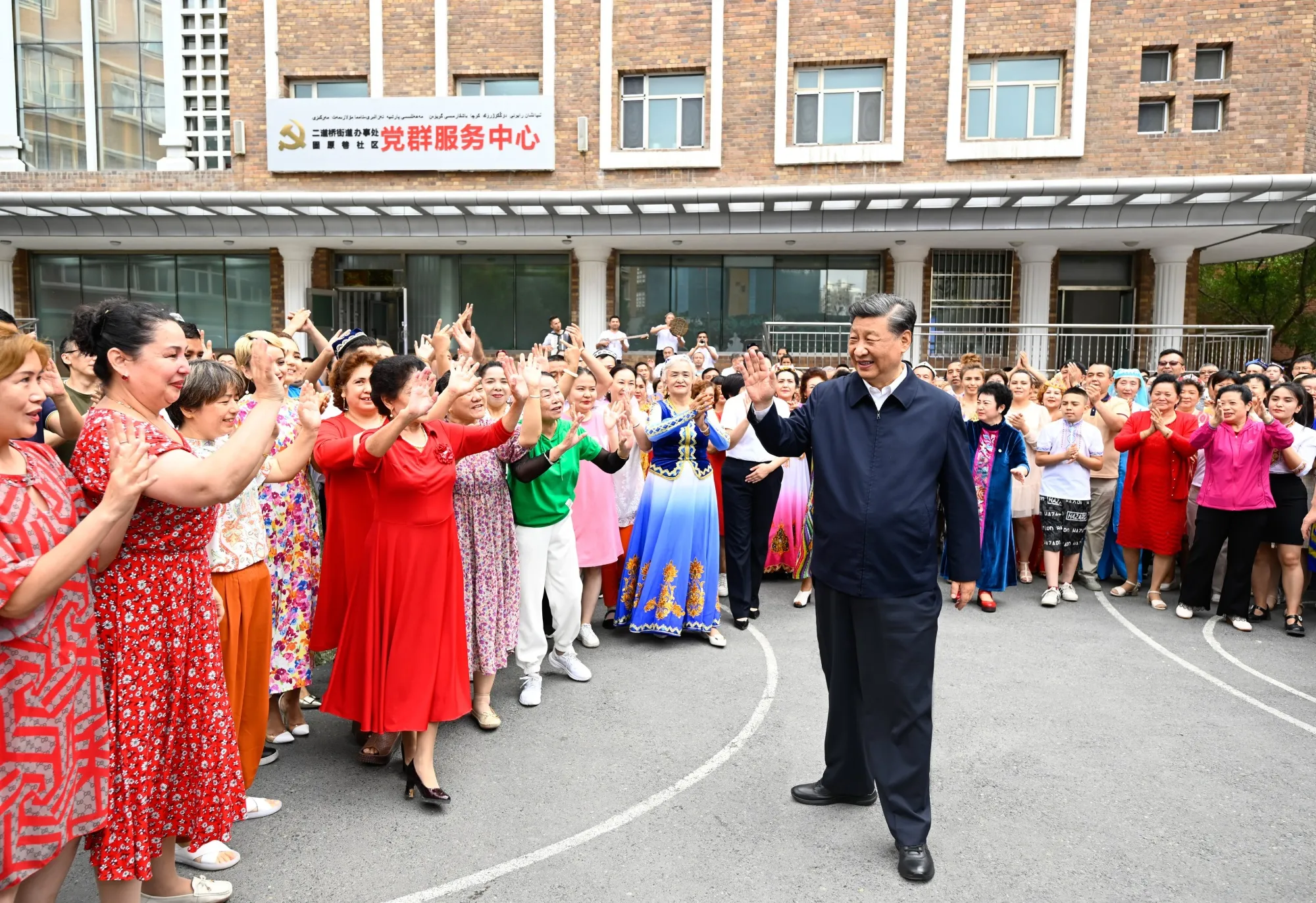 Xi Jinping visits the community of Guyuanxiang in Urumqi, capital of the Xinjiang Uyghur Autonomous Region.