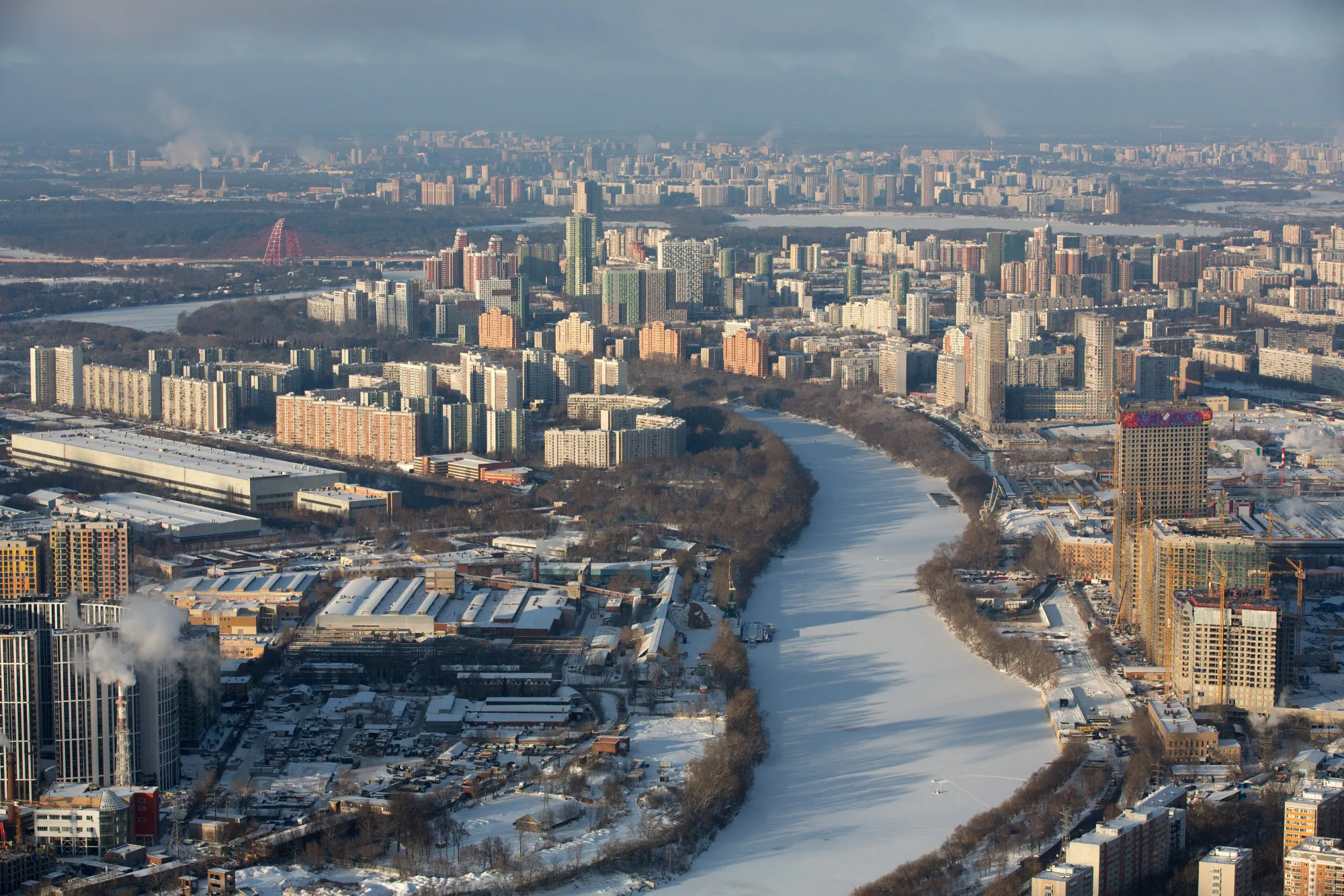 Residential and commercial properties stand on the banks of Moscow river, viewed from the OKO Tower at the Moscow International Business Center (MIBC), also known as Moscow City, in Moscow, Russia, on Thursday, Dec. 15, 2016.