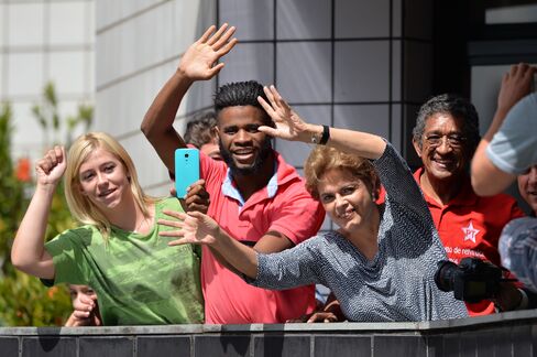 Dilma Rousseff and supporters gather outside Luiz Inacio Lula da Silva’s house