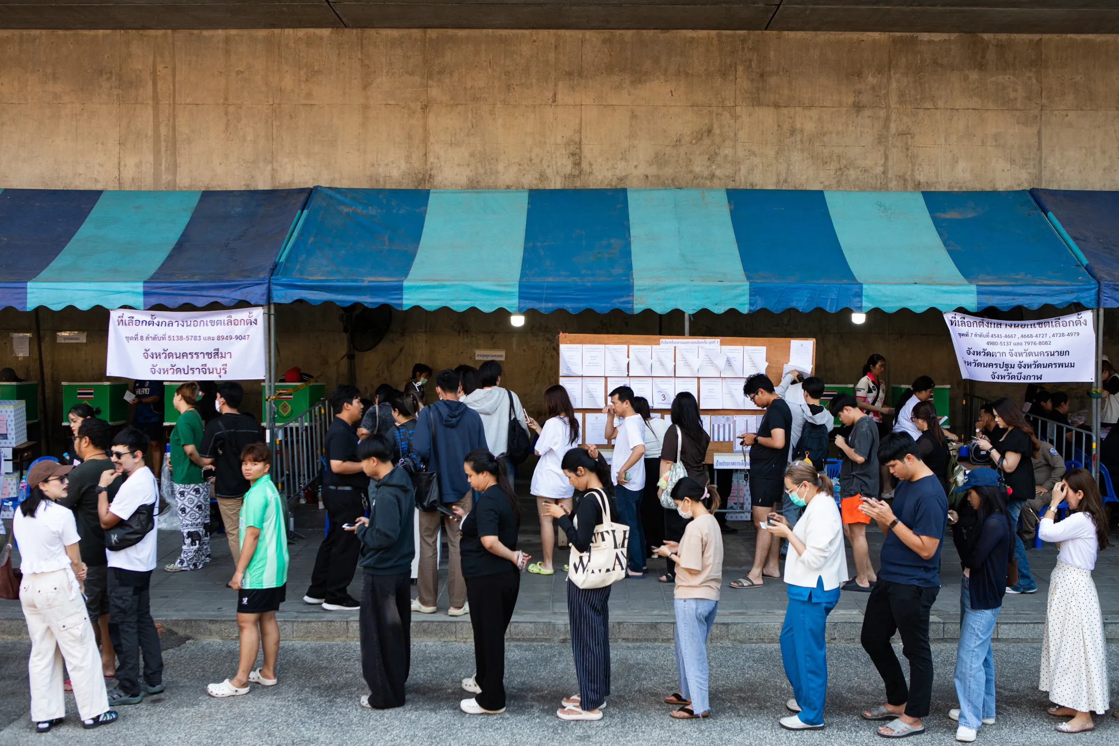 People line up at an early voting station in Bangkok, Thailand, on Feb. 1.