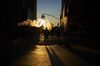 Steam rises as pedestrians cross a street near the New York Stock Exchange (NYSE) in New York, U.S.