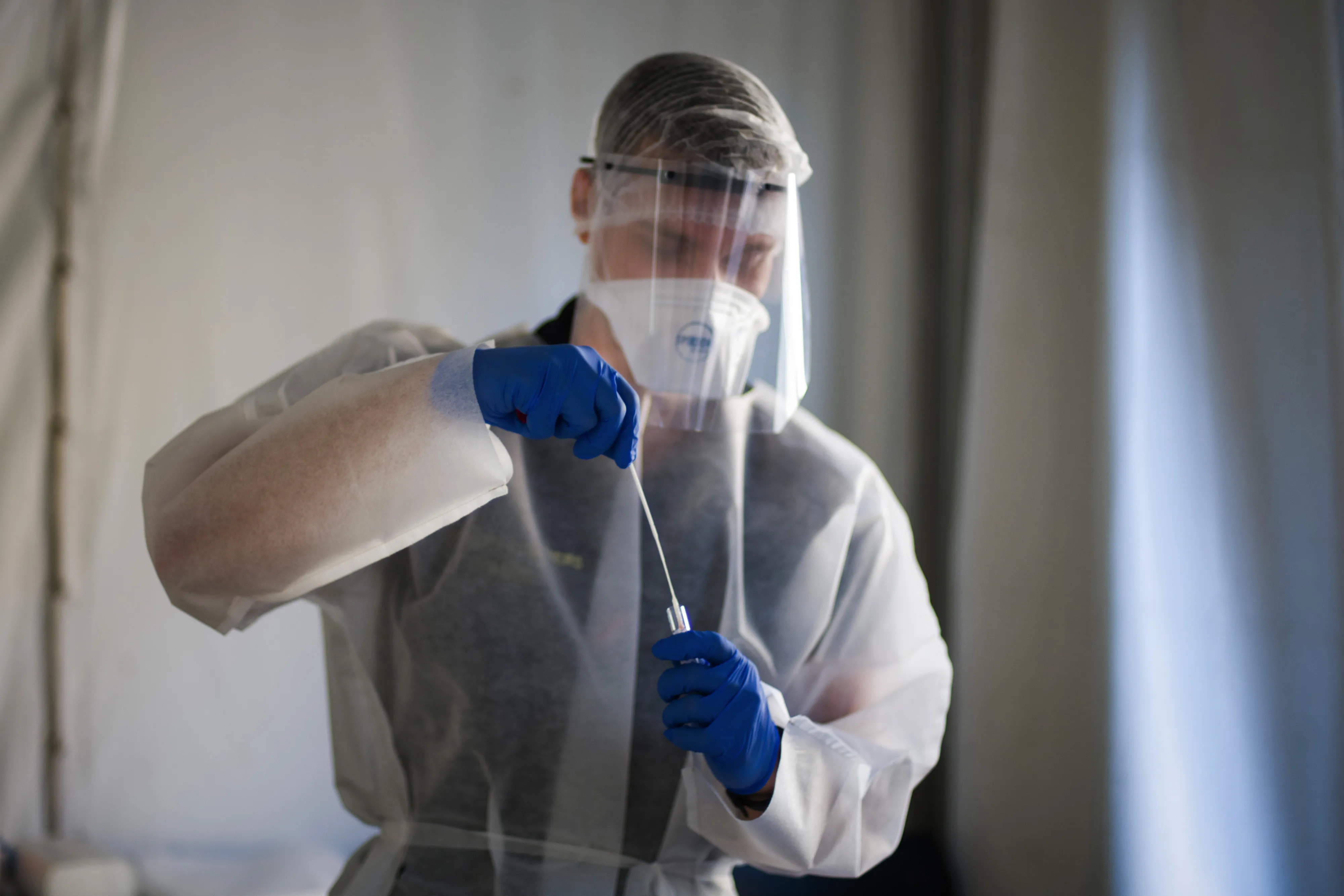 A medic holds a Covid-19 swab at a testing site in Paris,&nbsp;on&nbsp;Sept. 21.&nbsp;