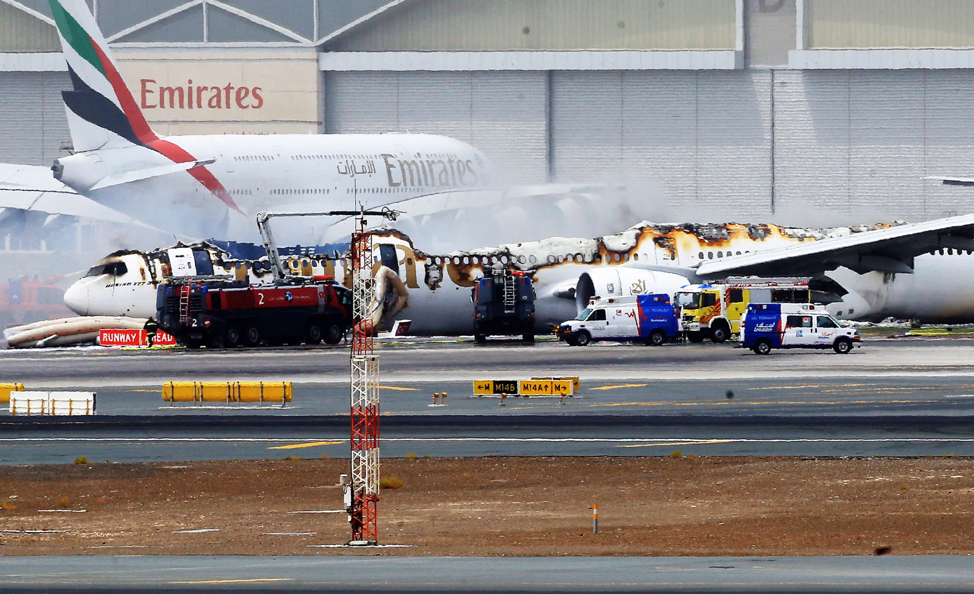 The Emirates jet after being gutted by fire at Dubai International Airport.
