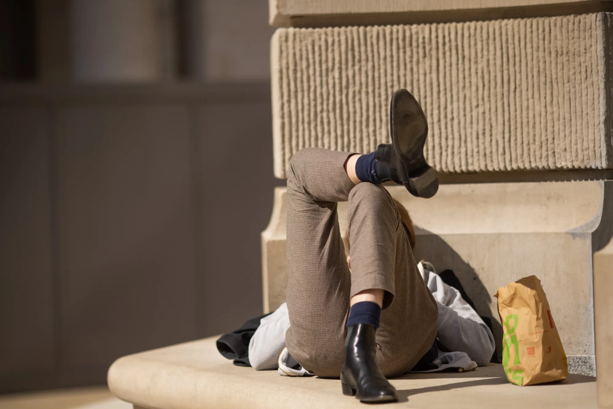 An office worker on their lunch break outside the London Stock Exchange in London&nbsp;on Monday, March 22, 2021.&nbsp;