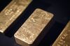 A 12.630 gram gold bar, the third one owned by Deutsche Bundesbank, sits on display in the German national gold reserve exhibition inside the Deutsche Bundesbank in Frankfurt, Germany, on Friday, April 13, 2018. Money is piling into the precious metal, taking holdings in global gold-backed exchange-traded funds to the highest since 2013 amid mounting Middle East tensions after a suspected chemical-weapons attack in Syria.