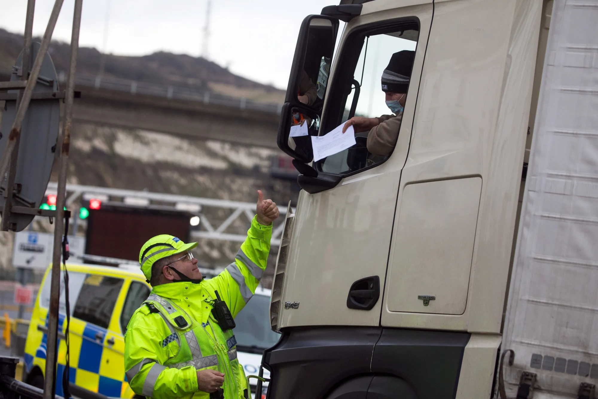 A policeman&nbsp;checks a drivers&nbsp;paperwork at the Port of Dover Ltd.&nbsp;on Jan. 5.