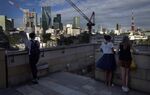 Tokyo Shoppers and Cityscapes Ahead of Japan\'s Revised Second Quarter GDP Announcement