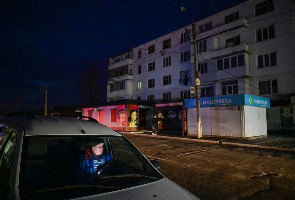 A man looks on from inside a car&nbsp;during a planned&nbsp;power outage&nbsp;in the Moldovan village of Varnita.