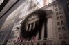 The New York Stock Exchange (NYSE) is reflected in a mirrored-sign in New York, U.S., on Monday, Jan. 8, 2018. U.S. stocks were mixed, with the S&P 500 Index on track for its first decline of the year, as investors assessed the prospects for corporate earnings, while the dollar strengthened after three straight weekly declines.
