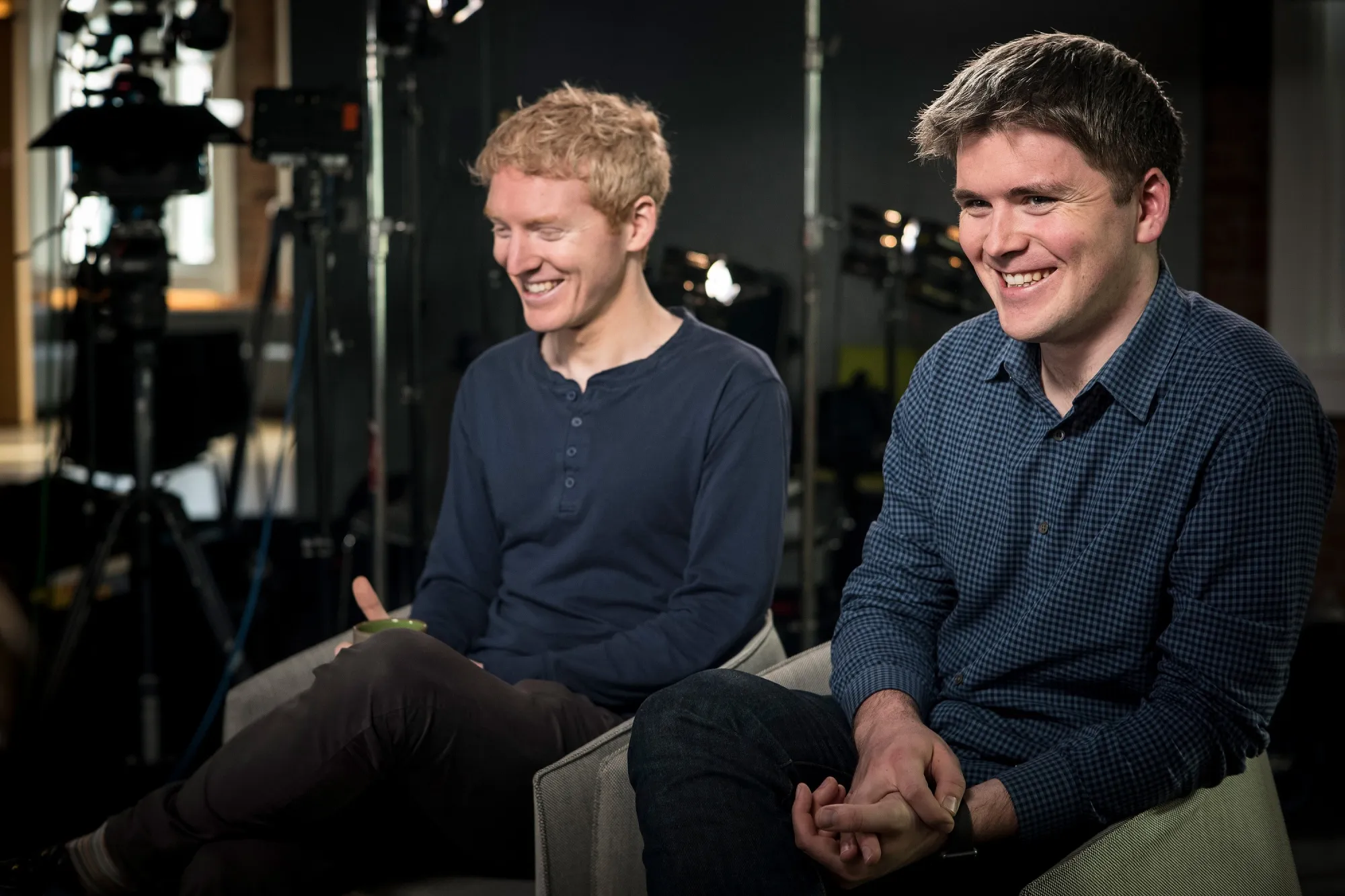 Patrick Collison, left, and John Collison,&nbsp;co-founders of Stripe Inc., smile during a Bloomberg Studio 1.0 television interview in San Francisco on March 23, 2018.&nbsp;