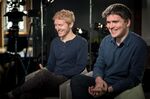 Patrick Collison, left, and John Collison, co-founders of Stripe Inc., smile during a Bloomberg Studio 1.0 television interview in San Francisco on March 23, 2018. 